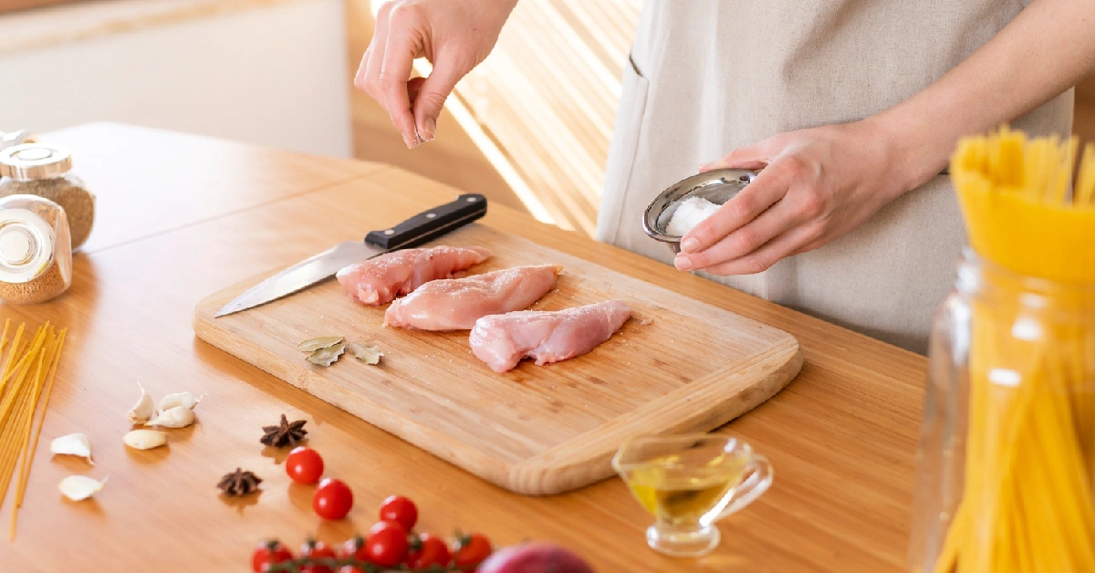 Chicken breasts marinating in a flavorful mixture.