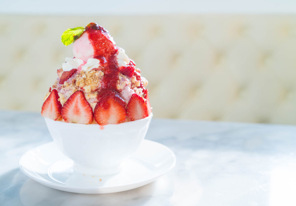 Illustration of strawberry shortcake ice cream in a bowl