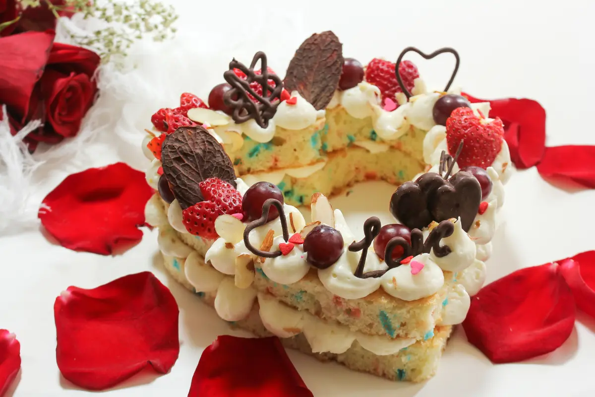 Heart-shaped cake on display, symbolizing love and celebration