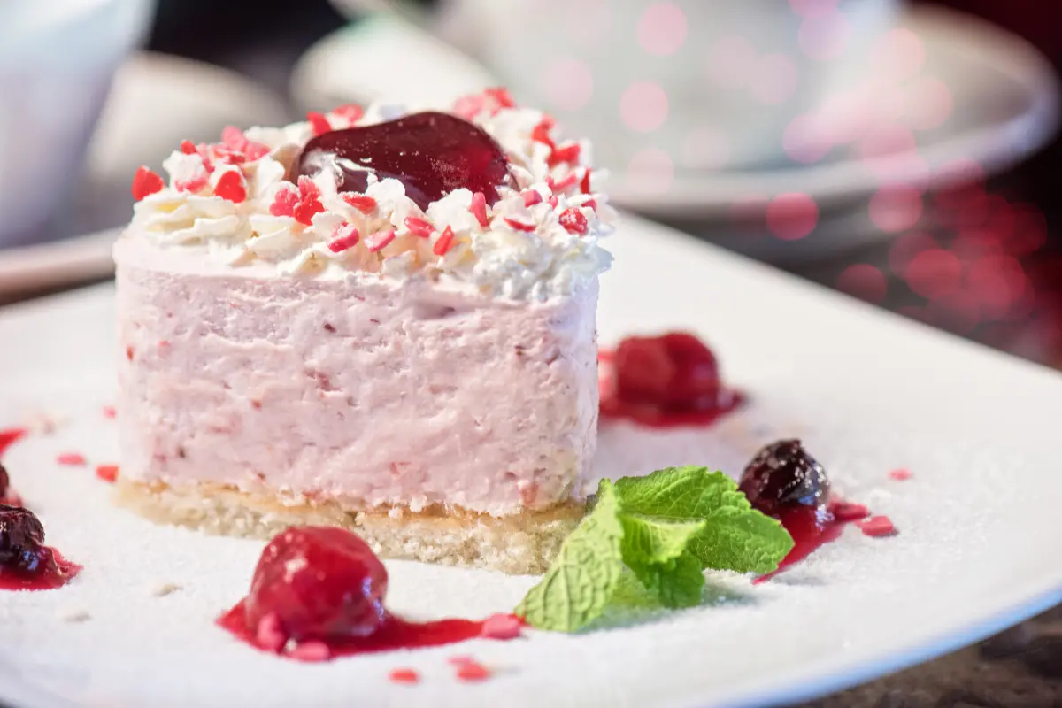 Featured heart-shaped cake on a celebratory table setting