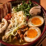 A cozy dinner setting with a steaming bowl of ramen at home.